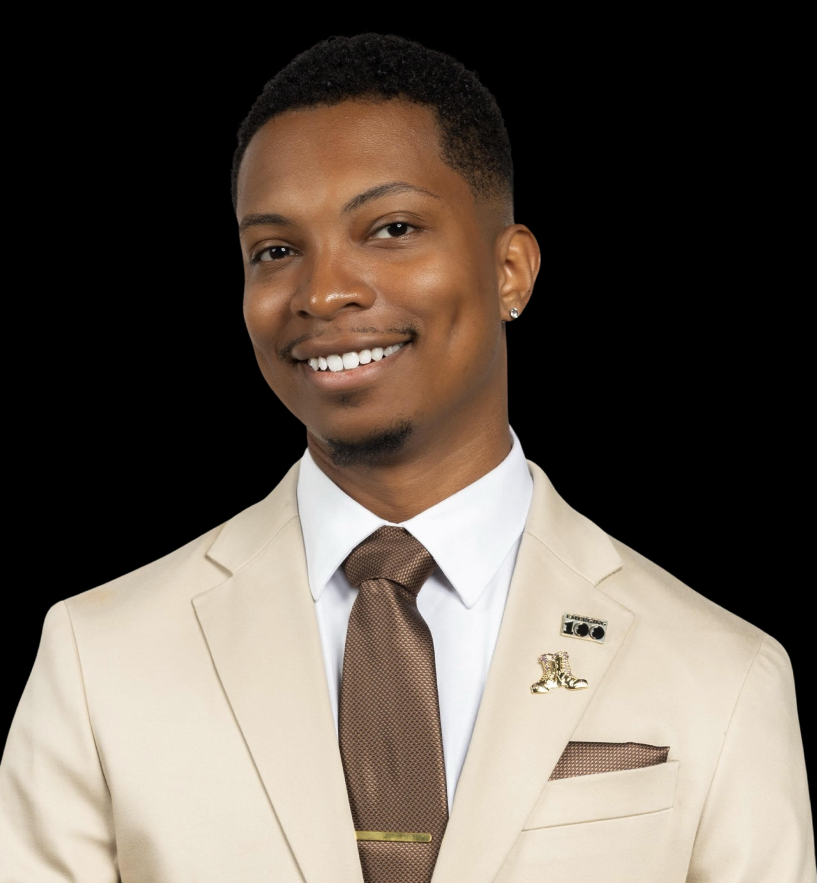 Professional headshot of Malik Coley